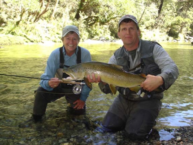 Susie McDowell USA, with trophy South Island brown trout, guided by Bryan Wilson, Reefton fishing guide.
