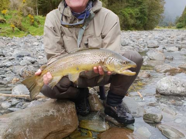 Hugh Foxcroft, Australia,  with a South Island New Zealand brown trout, guided by Reefton fly fishing guide, Bryan Wilson