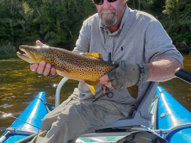 Randy Dix USA with a South Island New Zealand brown trout, guided by Reefton fly fishing guide, Bryan Wilson