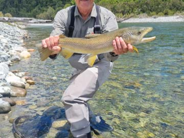 Fly fishing for Brown Trout in the Reefton area of the South Island, New Zealand with fishing guide Bryan Wilson
