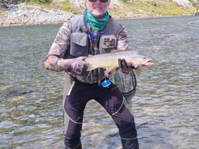 Fly fishing for Brown Trout in the Reefton area of the South Island, New Zealand with fishing guide Bryan Wilson