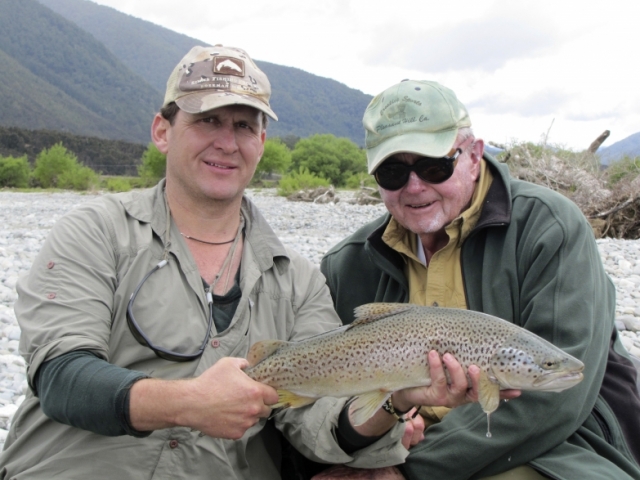 Reefton Fly Fishing guide Bryan Wilson and Pete Anderson USA with South Island New Zealand brown trout.