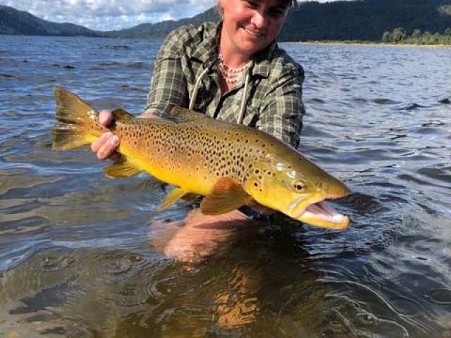 Whitney McDowell USA with a South Island New Zealand brown trout, guided by Reefton fly fishing guide, Bryan Wilson