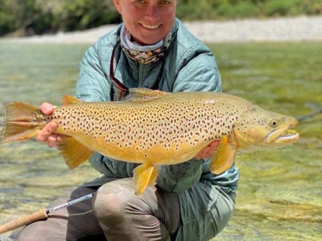 Trophy South Island brown trout caught by Whitney McDowell USA fishing with Reefton fishing guide, Bryan Wilson.