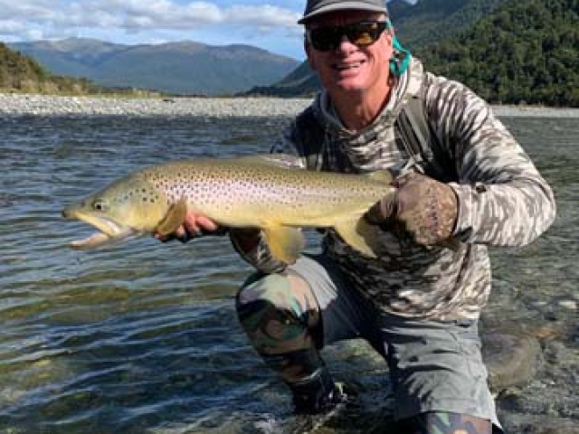 Fly fishing for Brown Trout in the Reefton area of the South Island, New Zealand with fishing guide Bryan Wilson