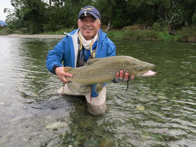 Trophy South Island brown trout caught by Sachio Nakagoshi, Japan, fishing with Reefton fishing guide, Bryan Wilson.
