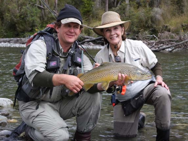Reefton Fly Fishing guide Bryan Wilson with Barb Anderson USA with South Island New Zealand brown trout.