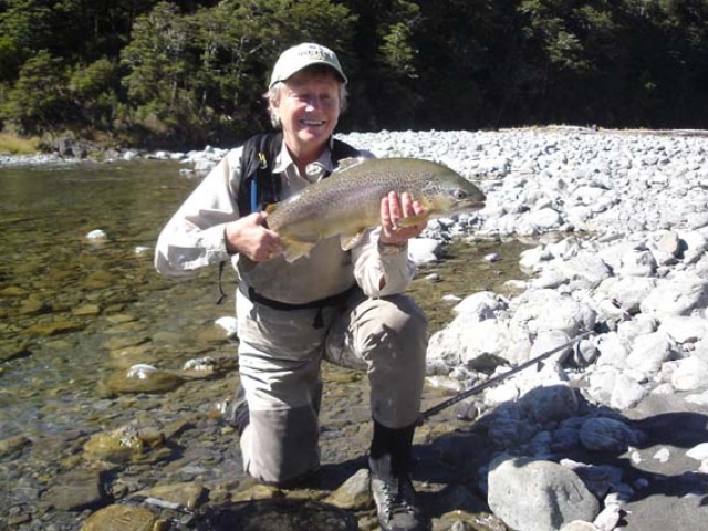 Susan McDowell USA with a South Island New Zealand brown trout, guided by Reefton fly fishing guide, Bryan Wilson