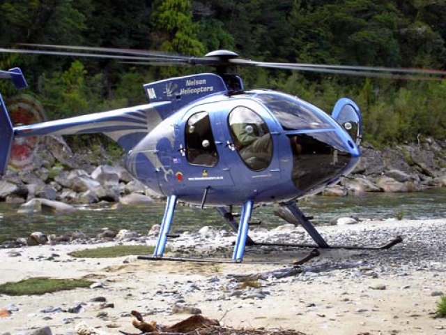Wilderness helicopter Fly fishing for Brown Trout in the South Island, New Zealand with fishing guide Bryan Wilson